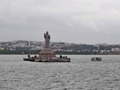 Tranquil ambiance of Hussain Sagar Lake during a peaceful morning